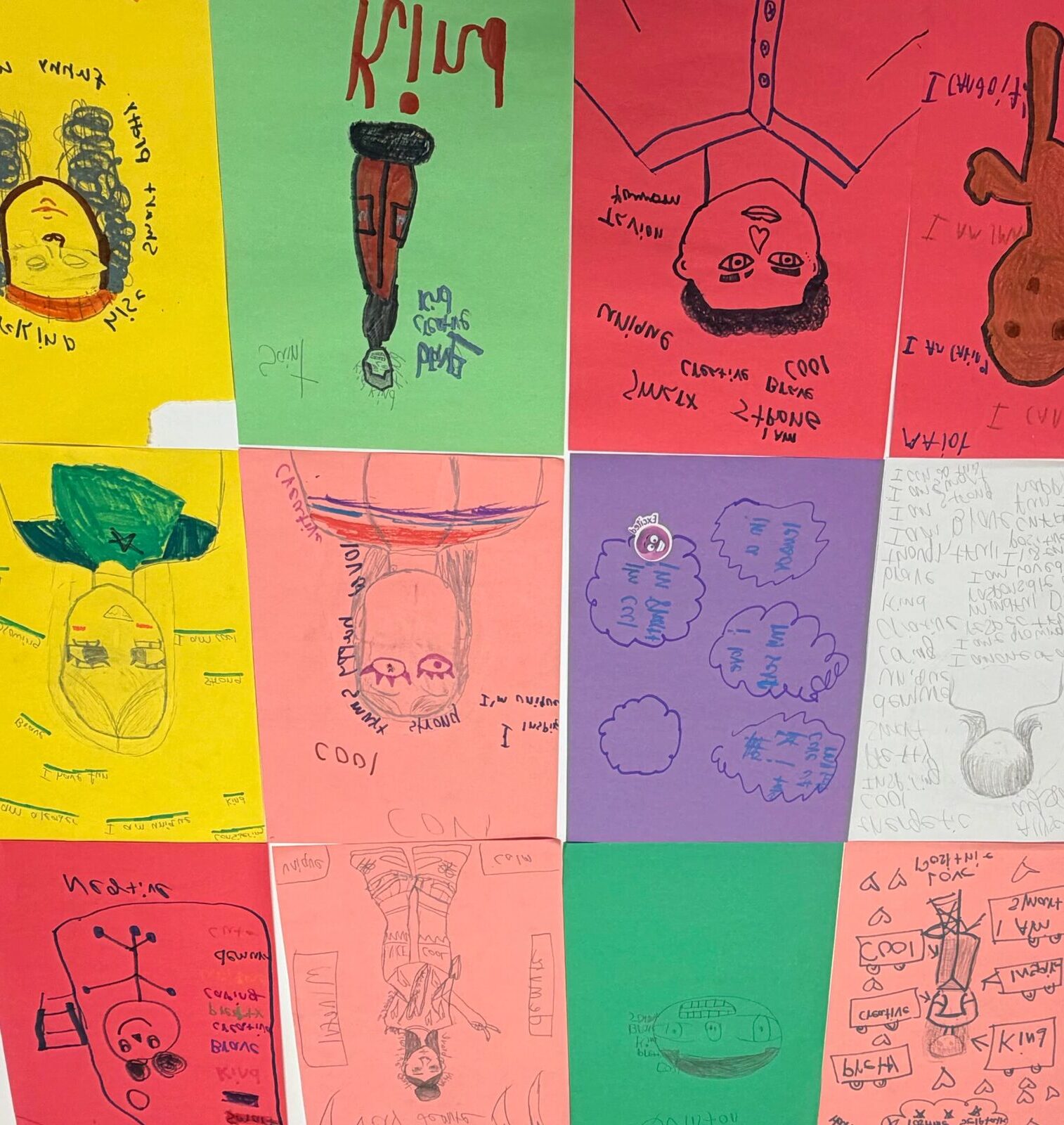 Colorful self-portrait posters made by students during a positive self-talk activity